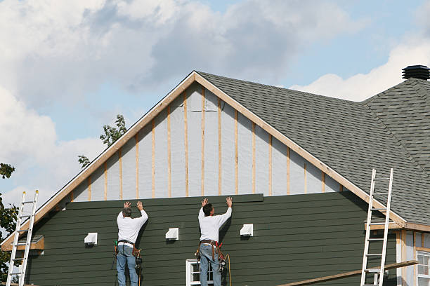 Professional Siding technician working in Ostrander, OH